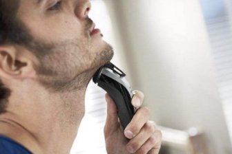 Electric trimmer shaping short facial hair